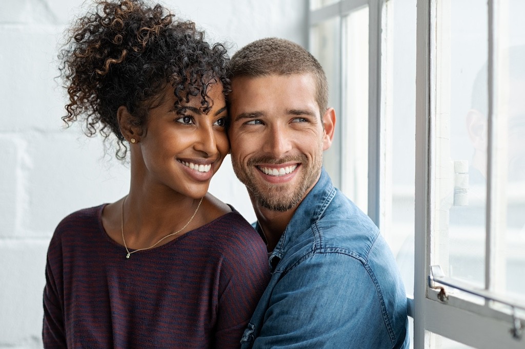 bigstock-Loving-multiethnic-couple-embr-309165430-1
