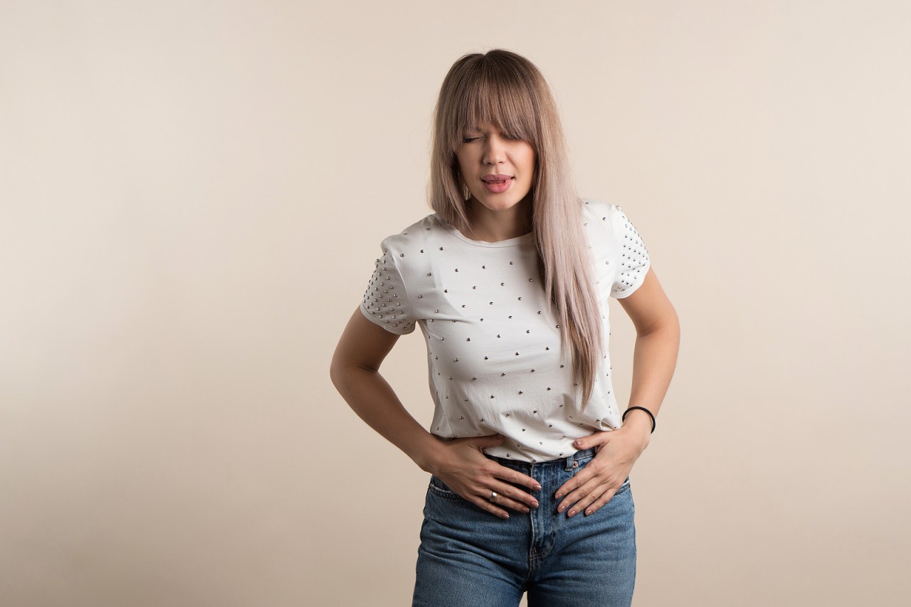 bigstock-Upset-Young-Woman-Keeps-Hands--445053203-2